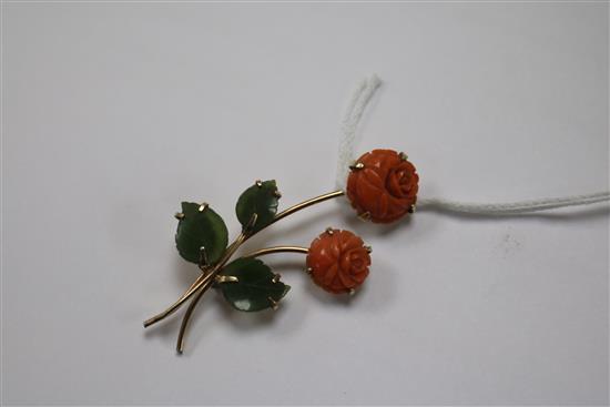 A gold, carved coral and jade rose brooch, 50mm.